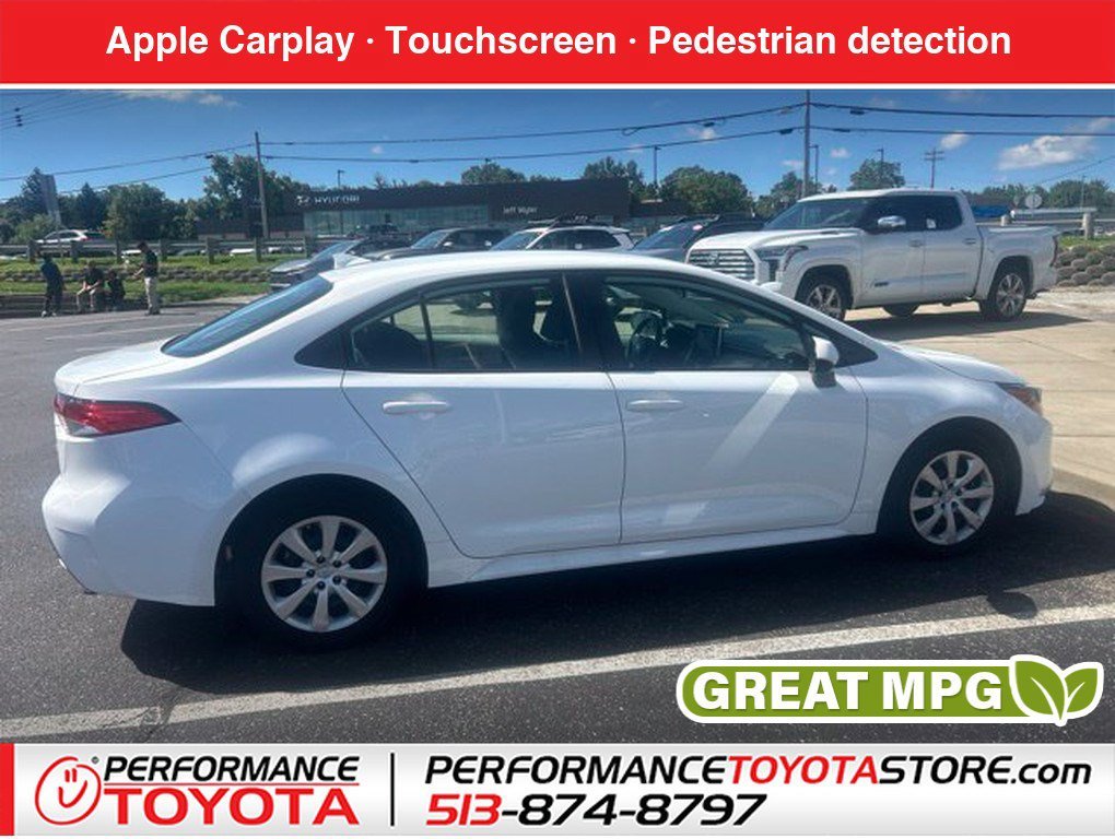 Used 2020 Super White Toyota LE image 1