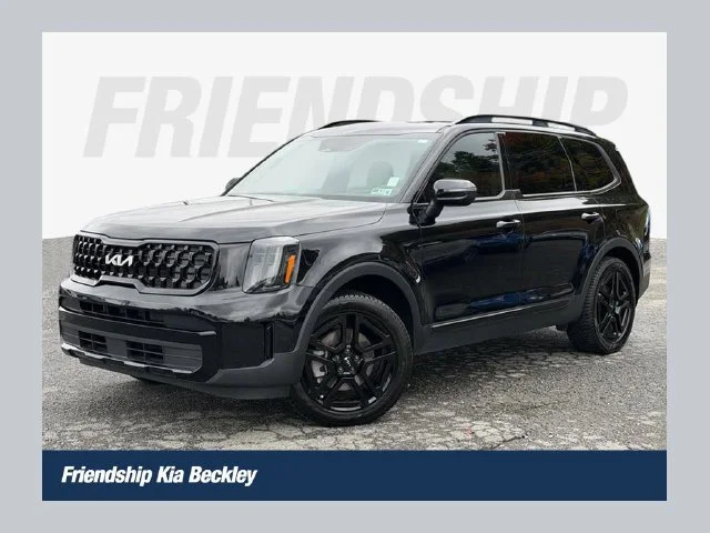 Used 2024 Black Kia EX X-Line image 1