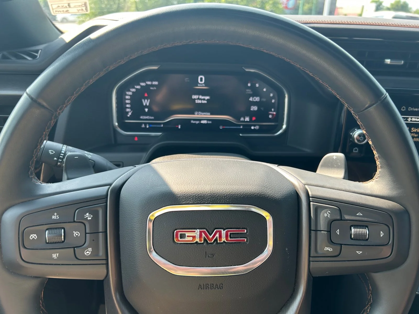 Used 2025 White GMC AT4 Crew Cab 3.0L Leather Sunroof Navigation 4x4 image 24