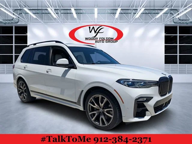 Used 2021 White BMW M50i image 1