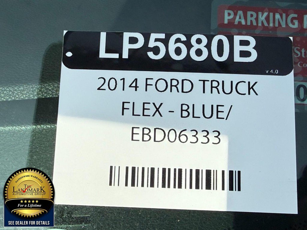 Used 2014 Deep Impact Blue Metallic Ford 4dr SEL AWD image 5