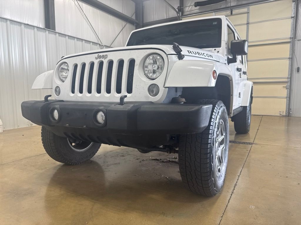 Used 2015 Jeep Wrangler Unlimited Rubicon with VIN 1C4BJWFG4FL739280 for sale in Carlyle, IL