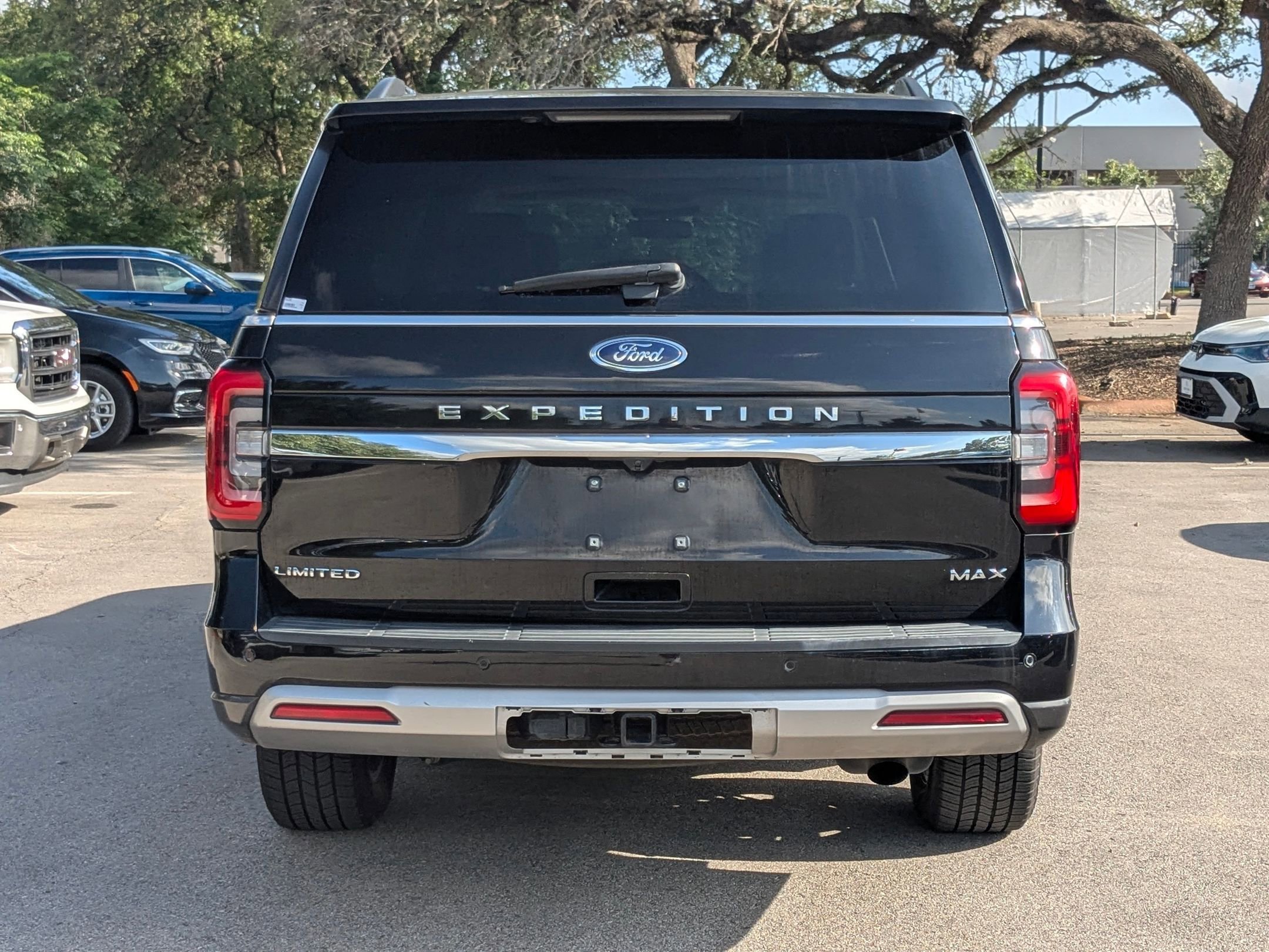 Used 2024 Black Metallic Ford Limited image 4