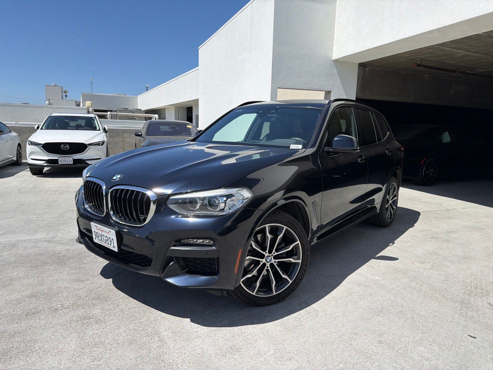 Used 2021 Carbon Black Metallic BMW sDrive30i image 3