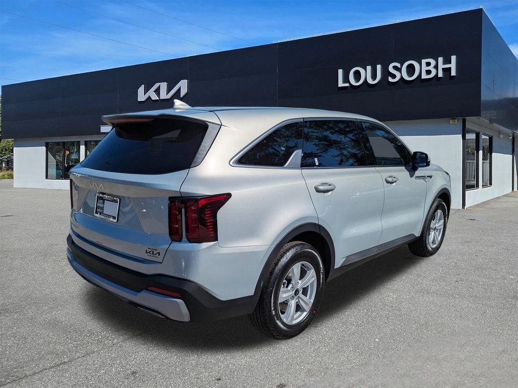New 2026 Ivory Silver Kia LX image 3