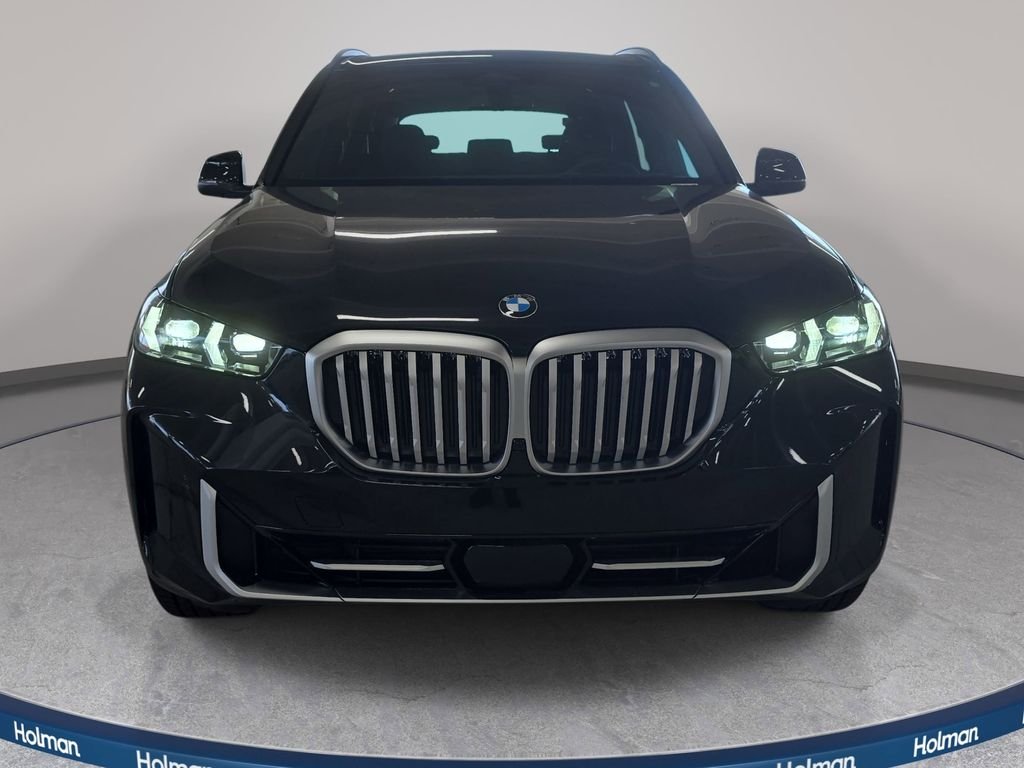New 2026 Black Sapphire Metallic BMW sDrive40i image 2