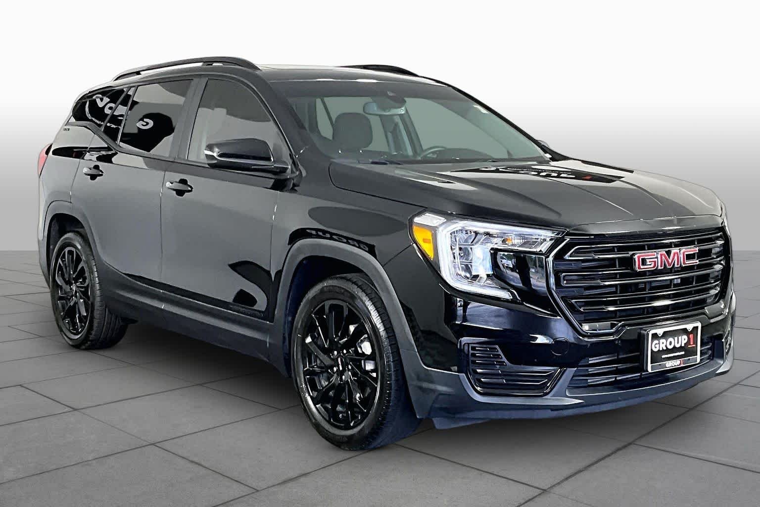 Used 2024 Ebony Twilight Metallic GMC SLE image 3