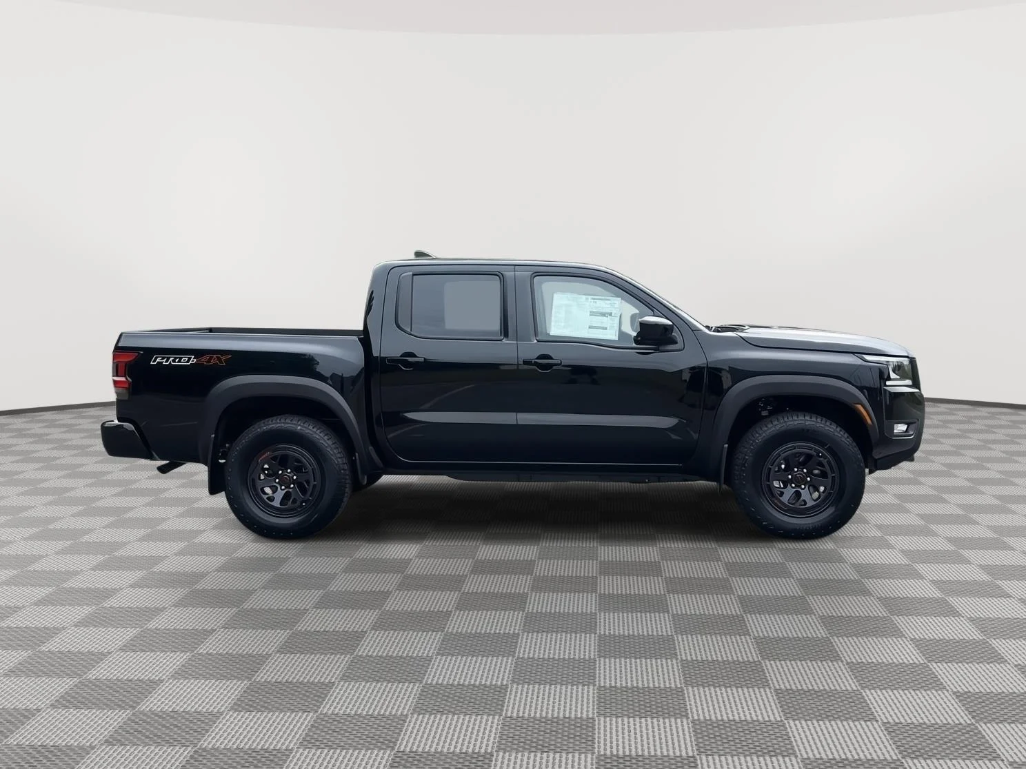 New 2026 Super Black Nissan Crew Cab PRO-4X® image 4
