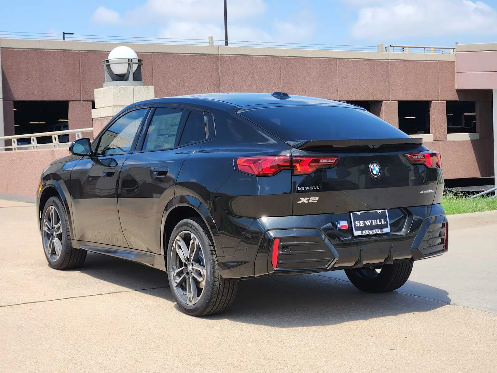 New 2026 Black Sapphire Metallic BMW xDrive28i image 3