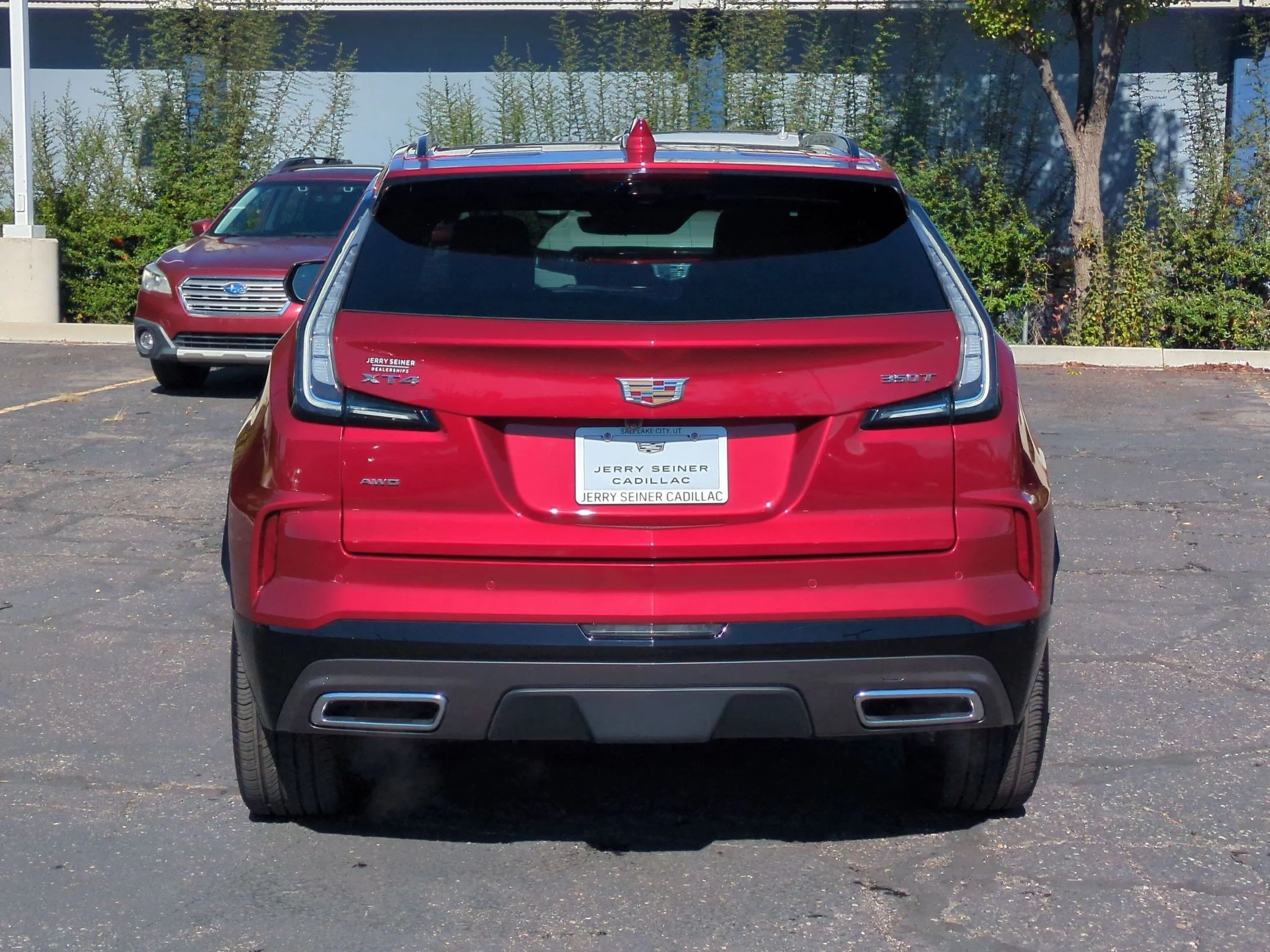 Used 2024 Radiant Red Tintcoat Cadillac AWD Sport image 4