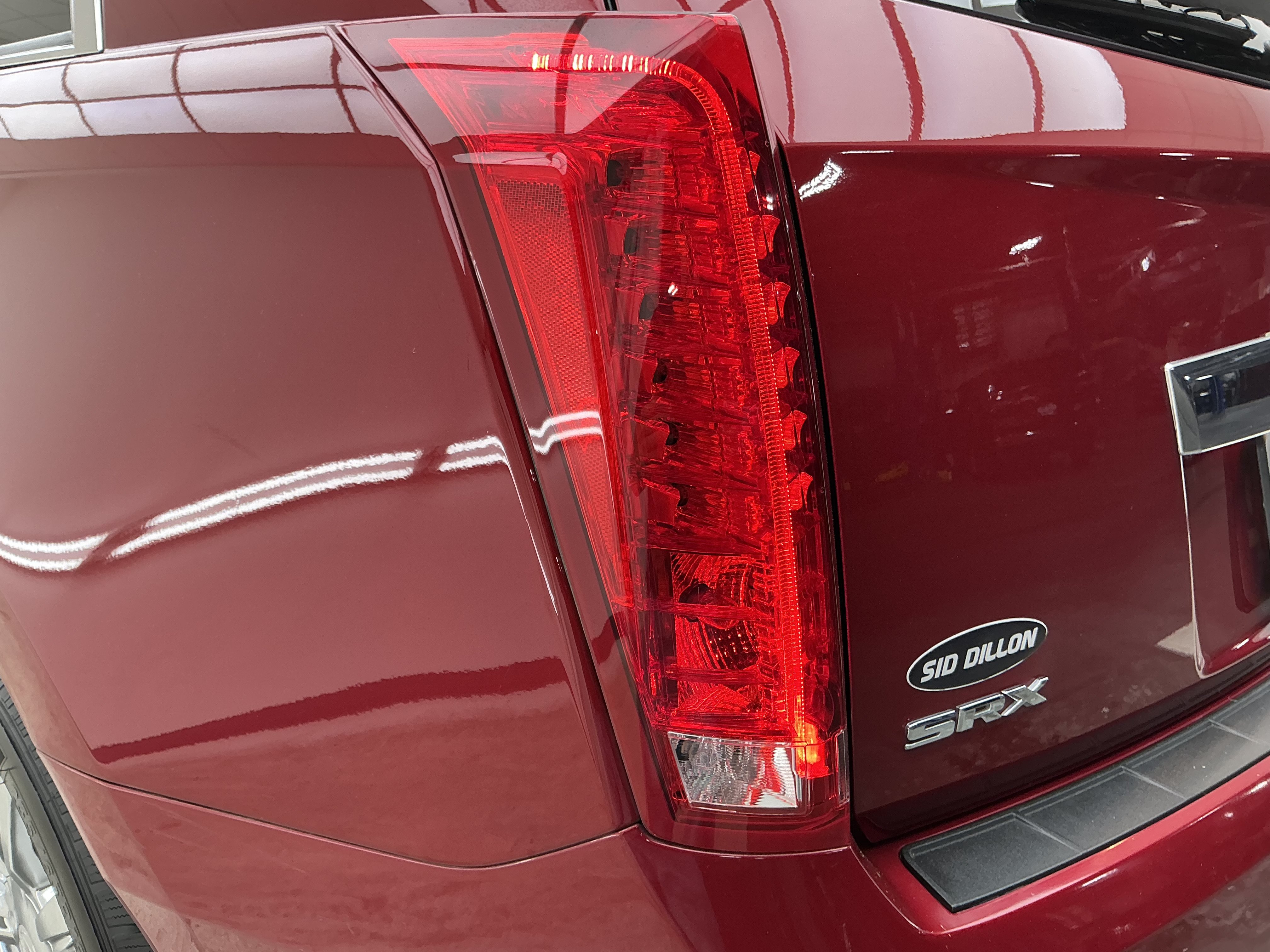 Used 2015 Crystal Red Tintcoat Cadillac Luxury Collection image 22