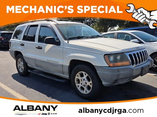 Used 1999 White Jeep Laredo image 1