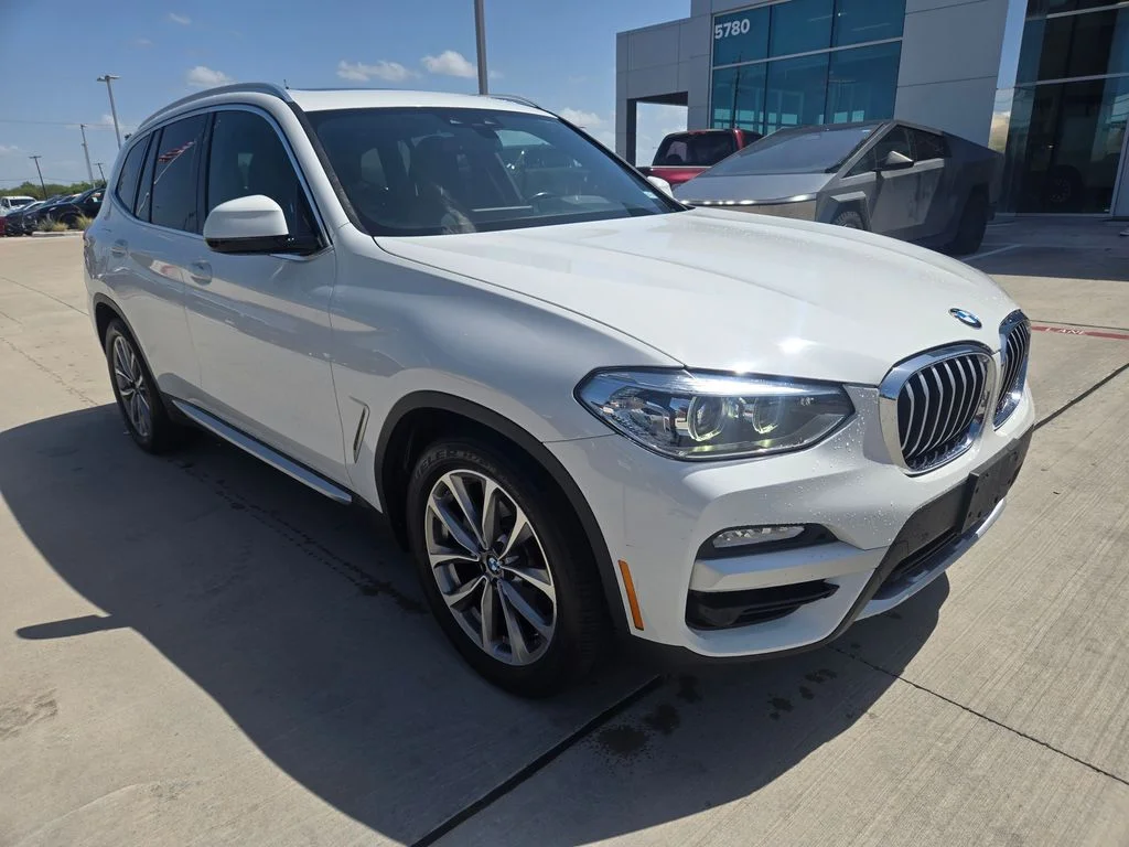 Used 2019 White BMW sDrive30i image 1
