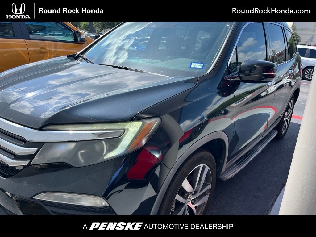 Used 2016 Crystal Black Pearl Honda Touring image 1