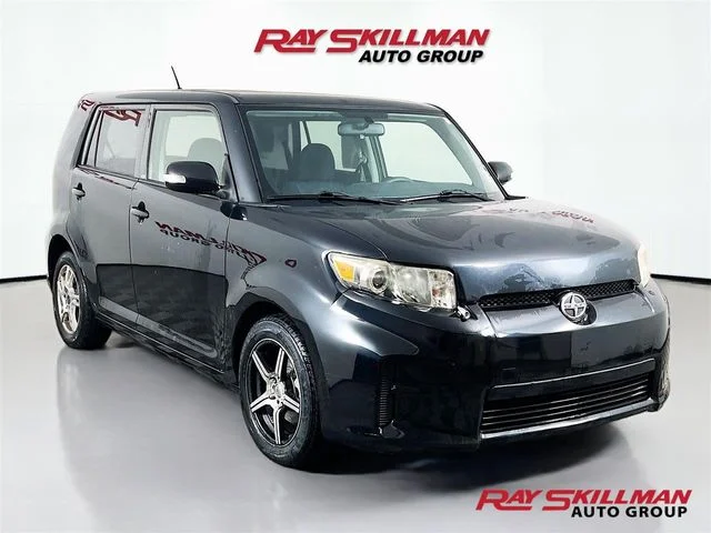 Used 2012 Black Scion FWD image 1