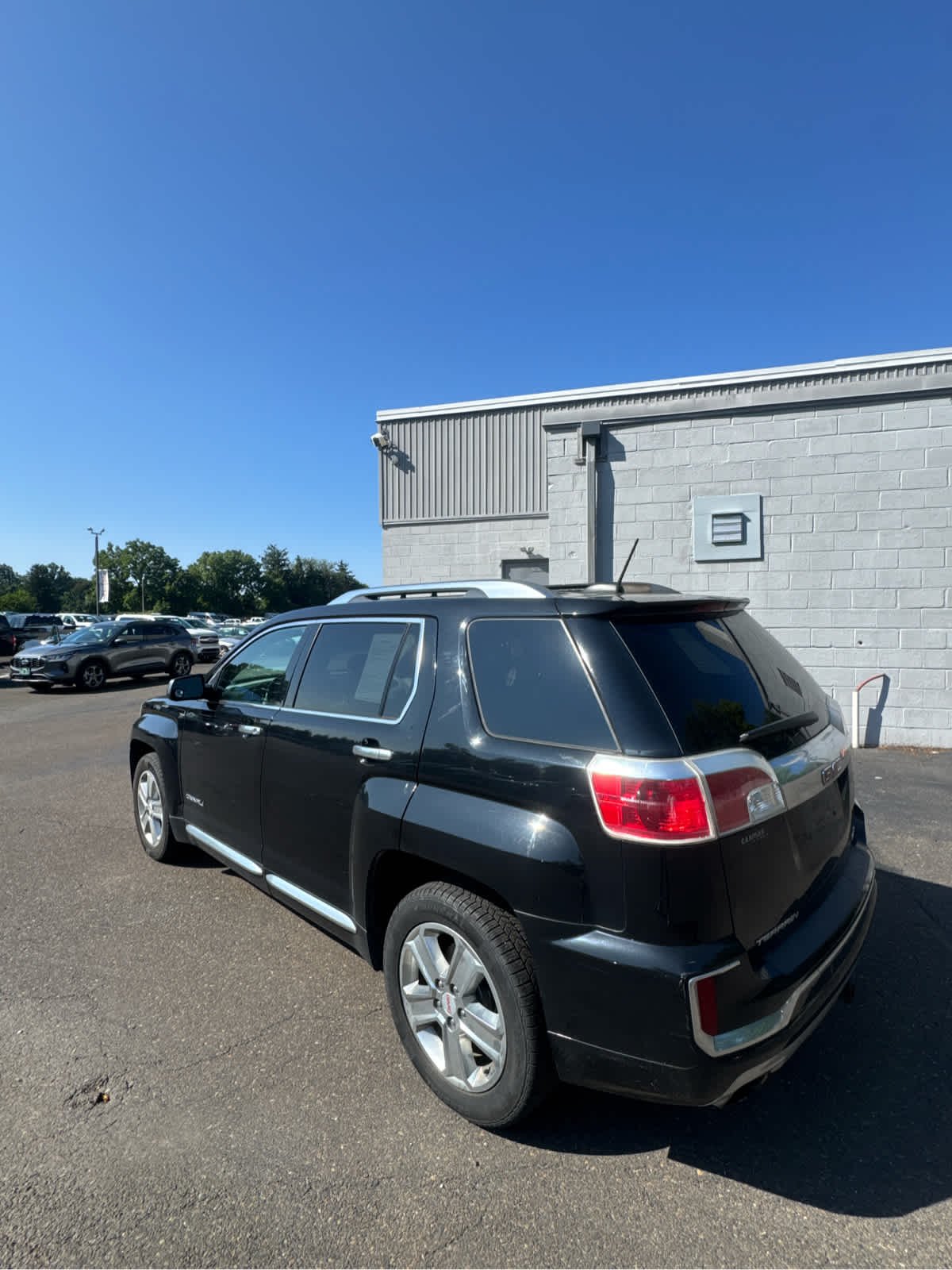 Used 2017 Ebony Twilight Metallic GMC Denali image 3