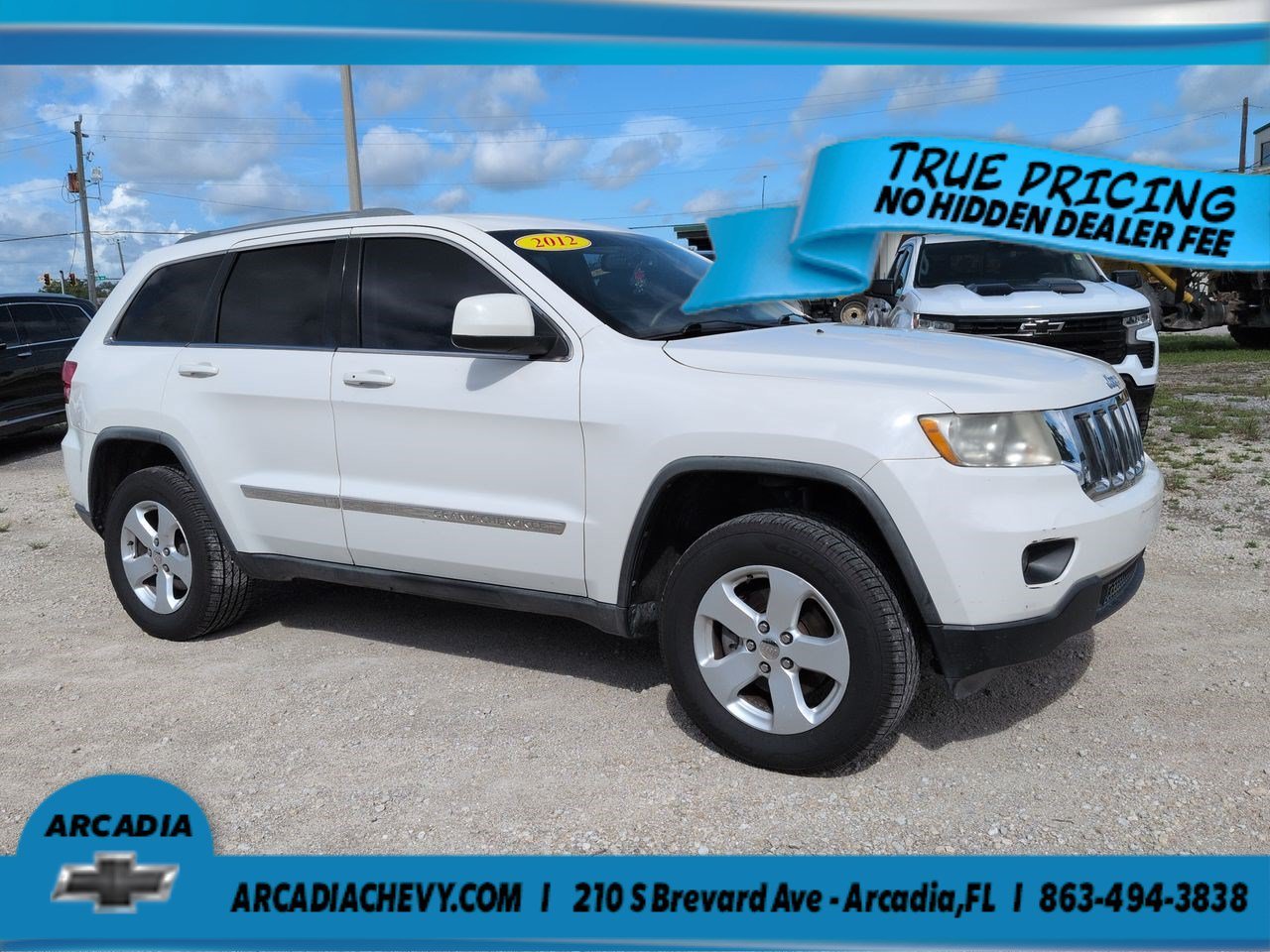 Used 2012 Stone White Jeep Laredo image 2