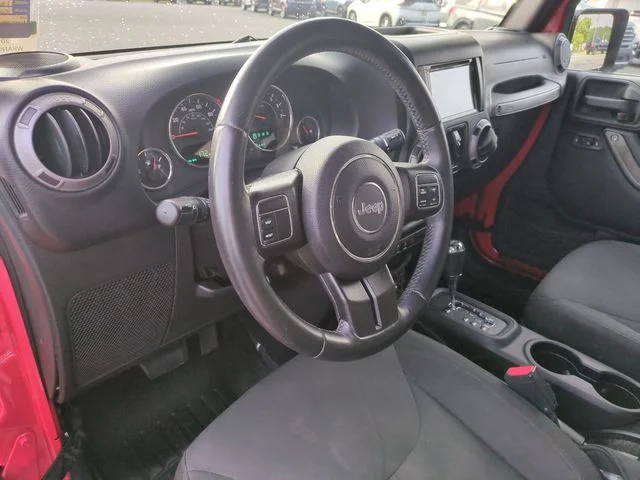 Used 2016 Red Jeep Unlimited Sport image 15