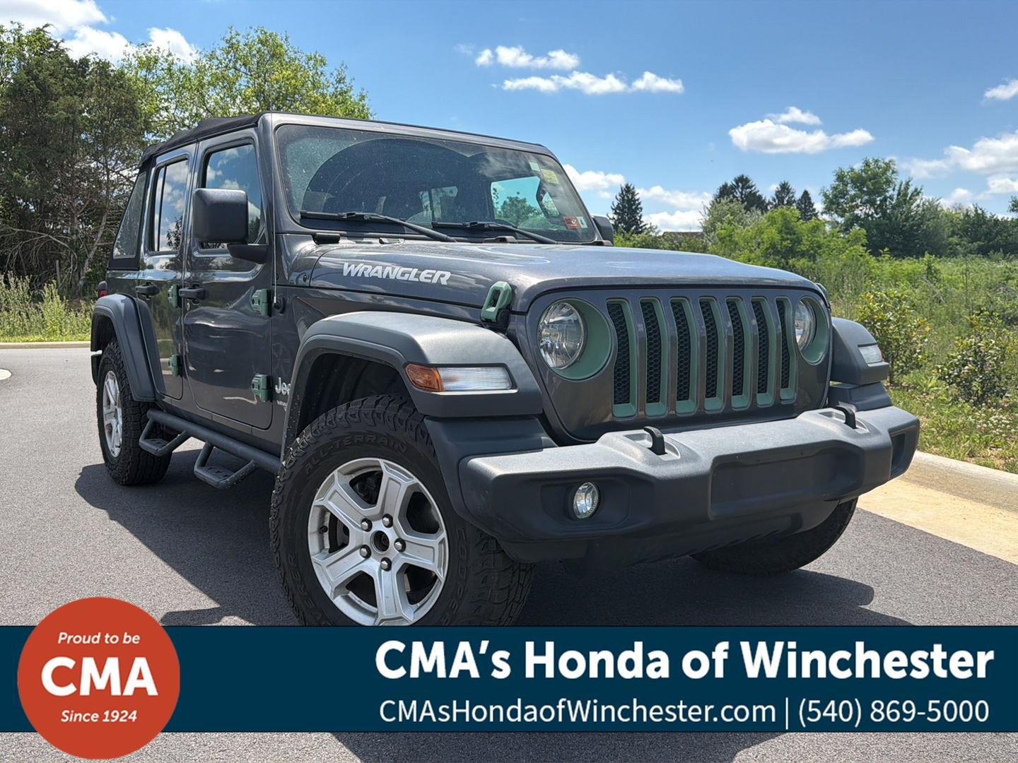 Used 2018 Granite Crystal Metallic Clearcoat Jeep Sport S image 1