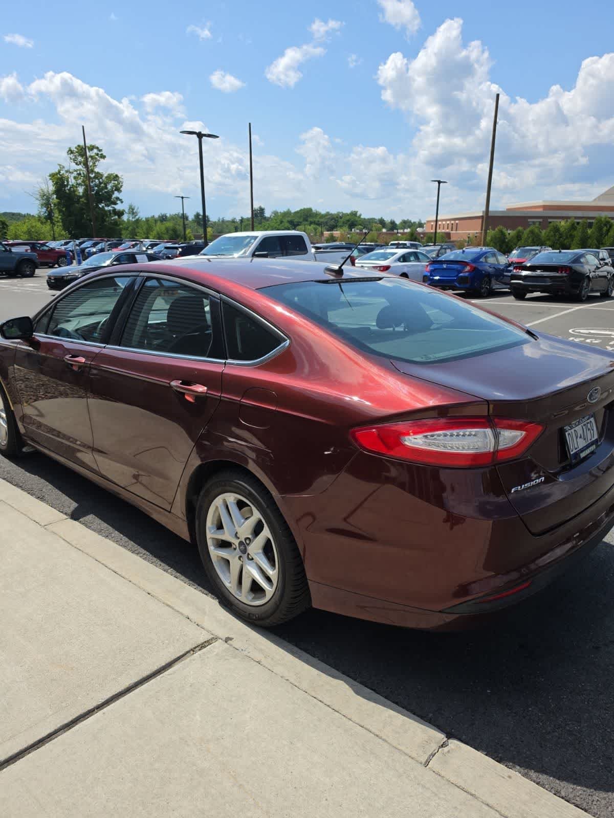 Used 2015 Ford Fusion SE with VIN 3FA6P0H7XFR201989 for sale in Latham, NY
