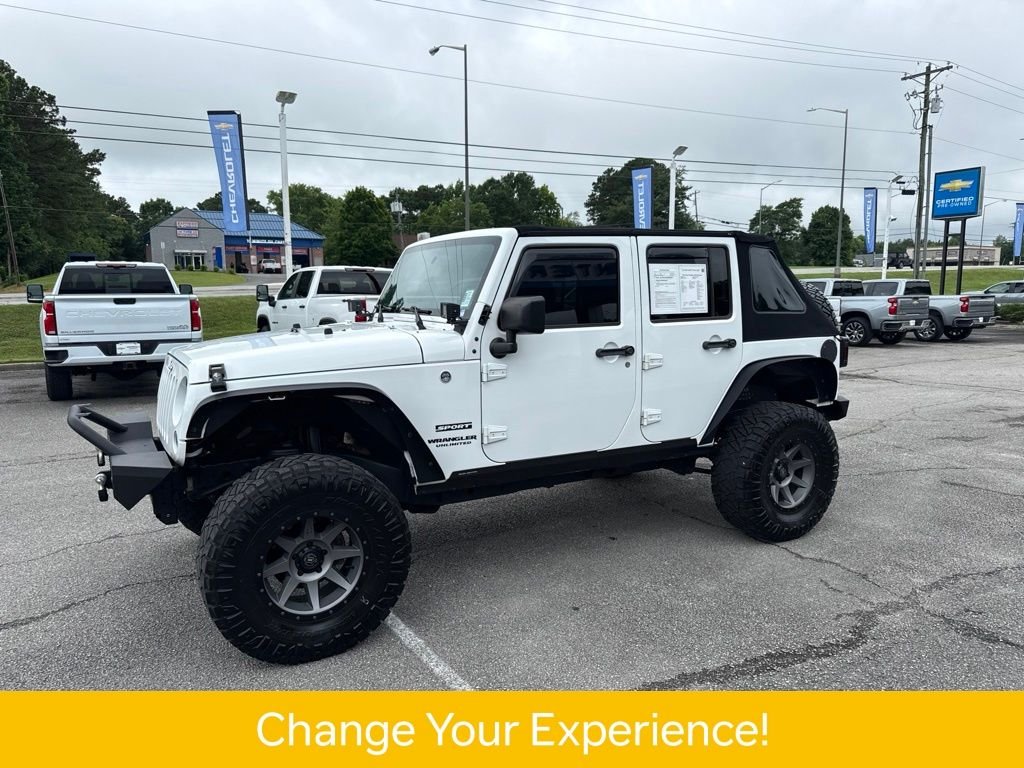 Used 2016 Jeep Wrangler Unlimited Sport with VIN 1C4BJWDG7GL340769 for sale in Guntersville, AL
