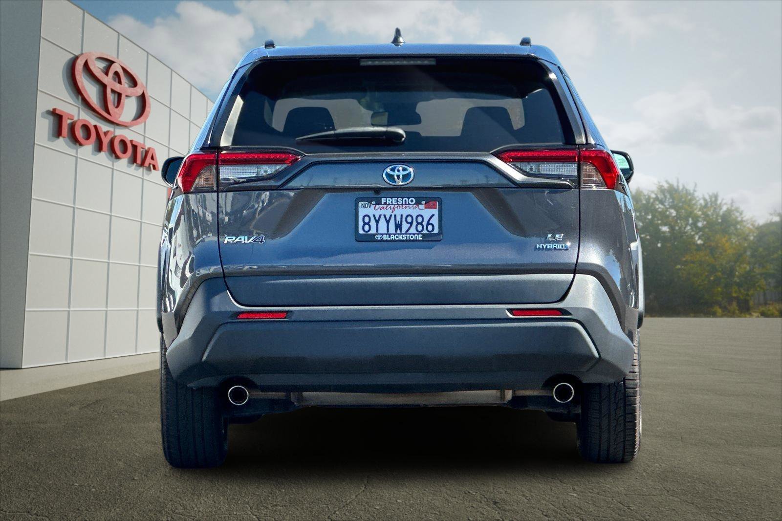 Used 2021 Magnetic Gray Metallic Toyota Hybrid LE image 4