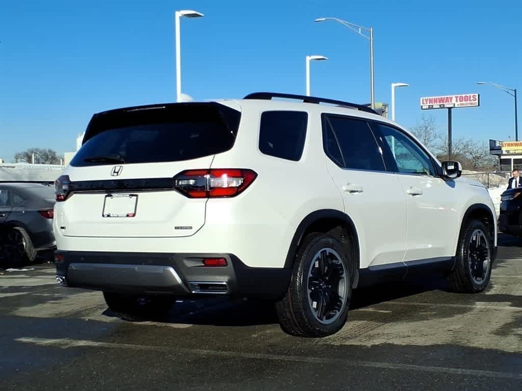 View vehicle photo 3