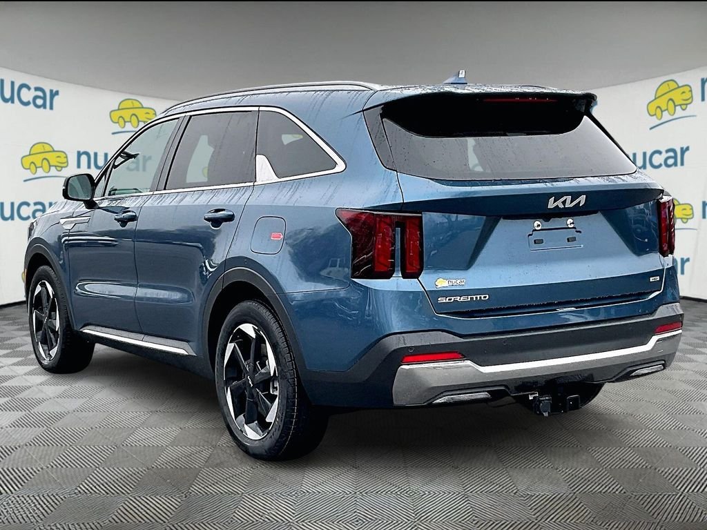 New 2026 Mineral Blue Kia EX image 4