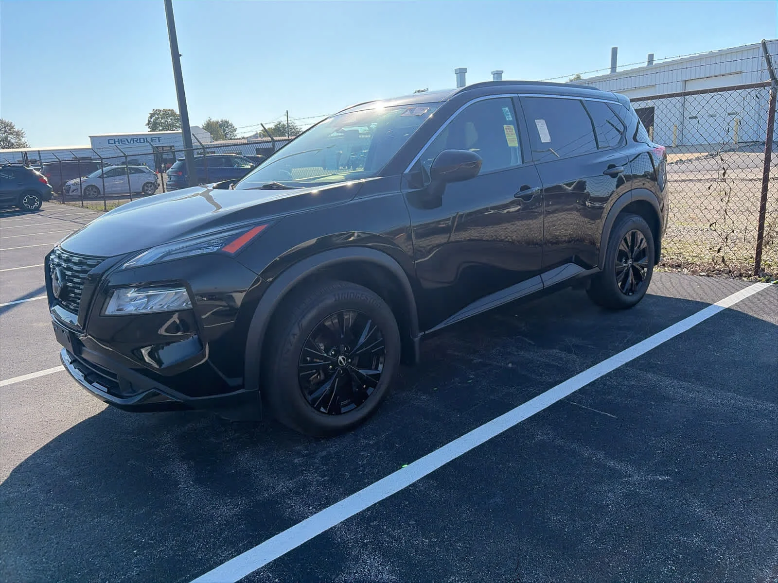 Certified Used 2023 Super Black Nissan SV image 1