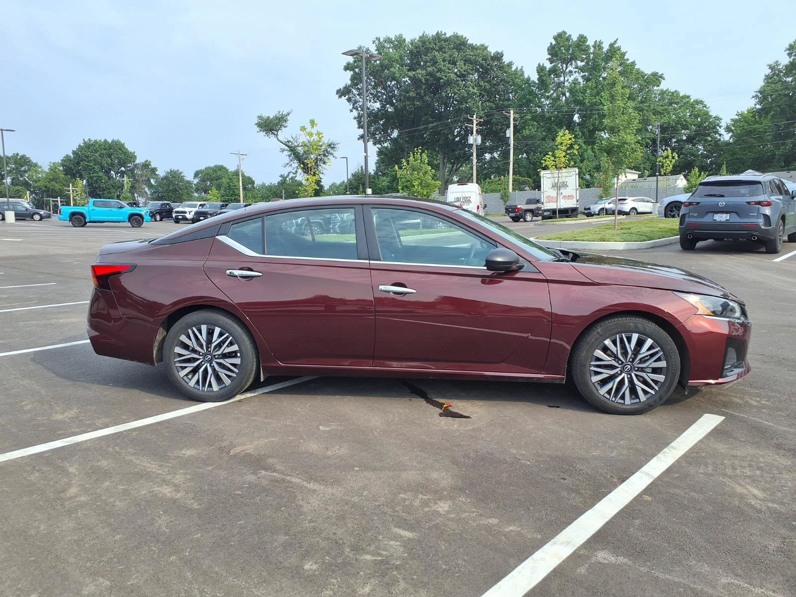 Used 2025 Garnet Pearl Metallic Nissan SV image 2
