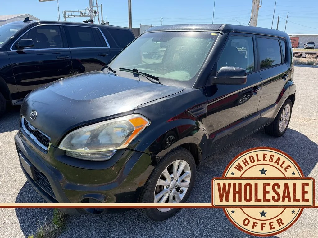 Used 2012 Gray Kia Plus image 1