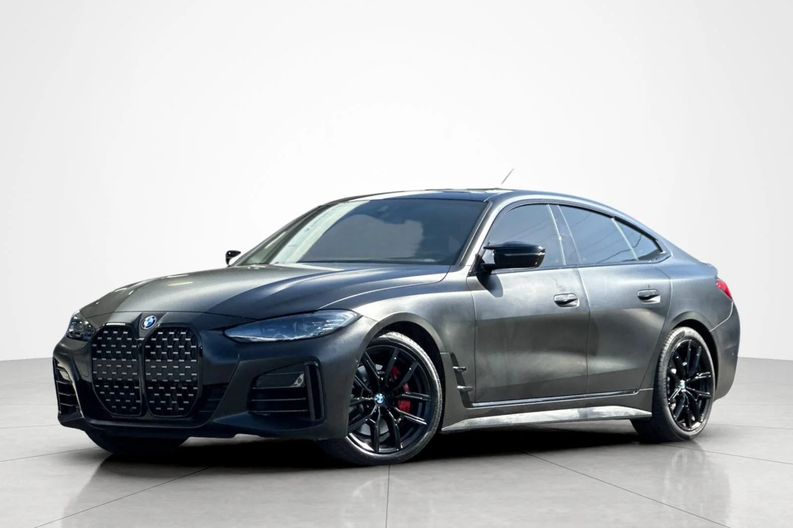 Used 2024 Black Sapphire Metallic BMW M440i image 1