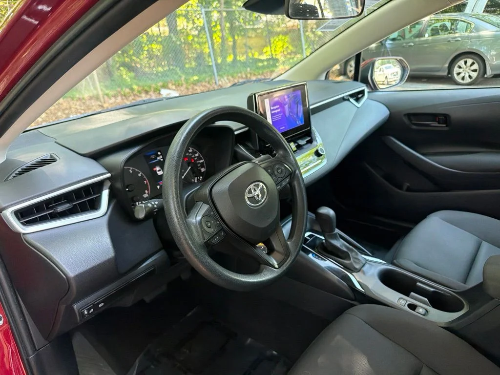 Used 2024 Ruby Flare Pearl Toyota LE image 12