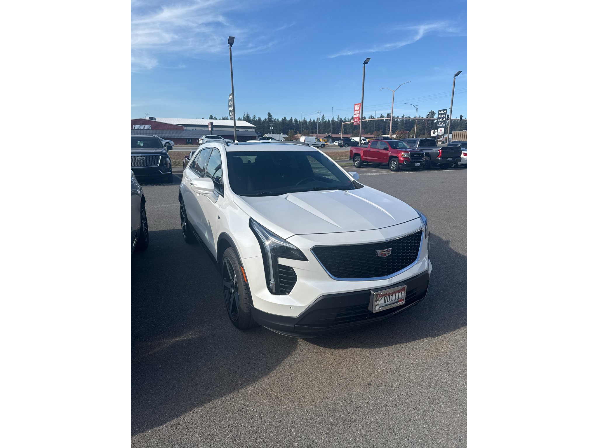 Used 2023 CRYSTAL WHITE TRICOAT Cadillac AWD Sport image 2