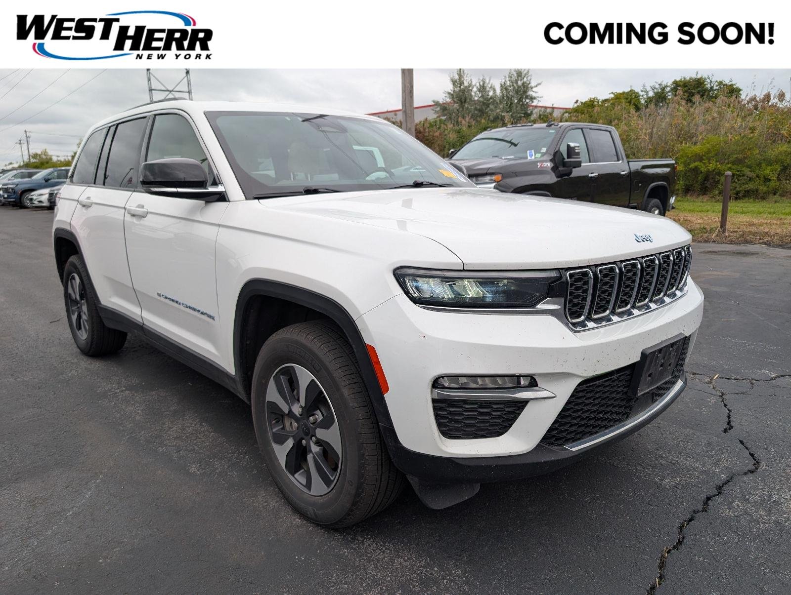 Used 2024 Bright White Clearcoat Jeep 4xe image 1