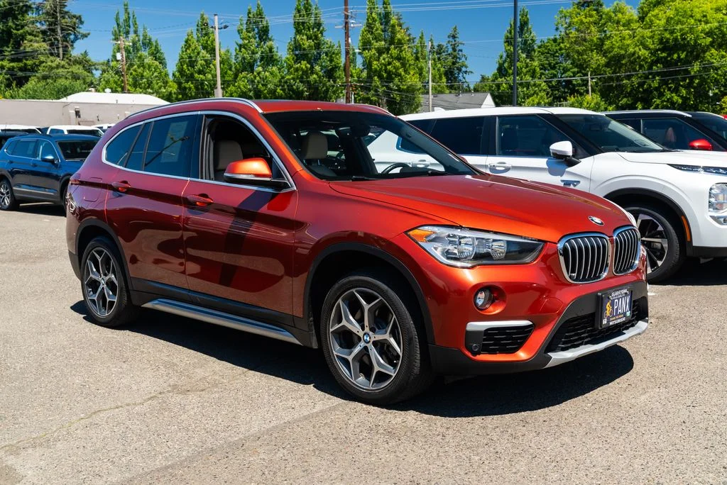 Used 2018 Orange BMW xDrive28i image 1