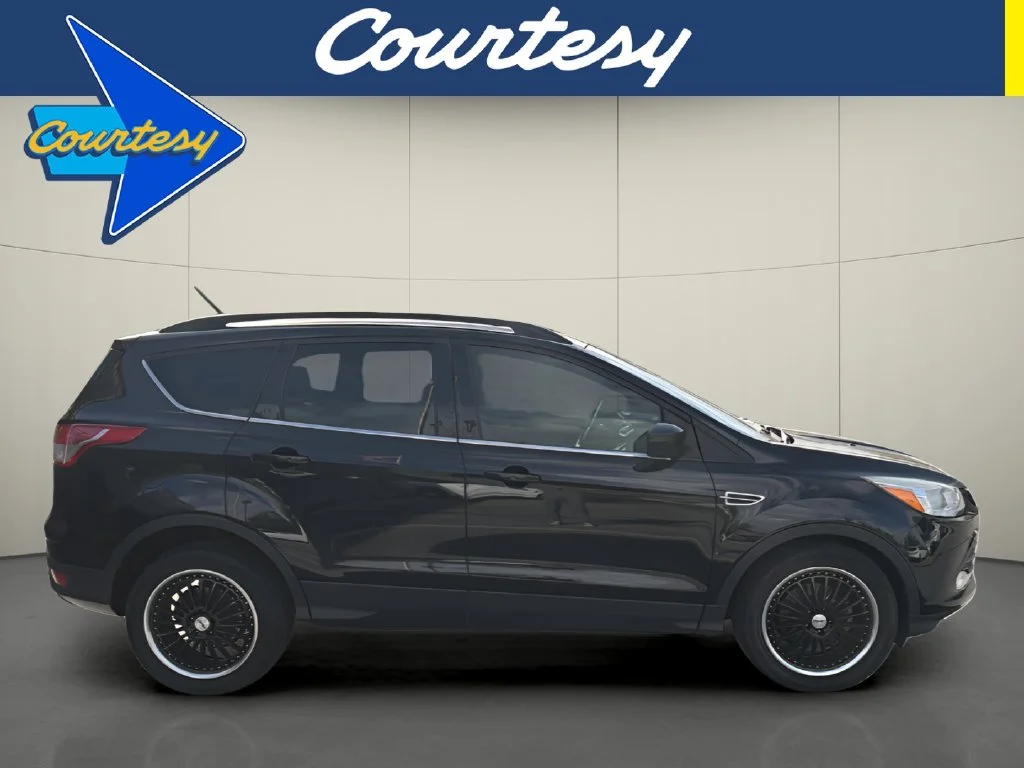 Used 2014 Black Ford SE image 1