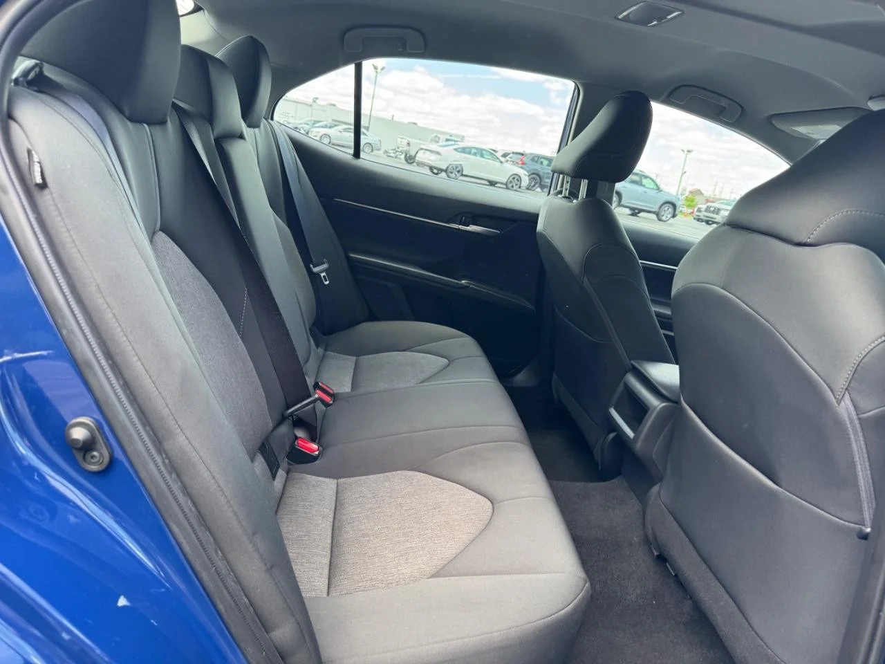 Used 2024 Reservoir Blue Toyota LE image 11