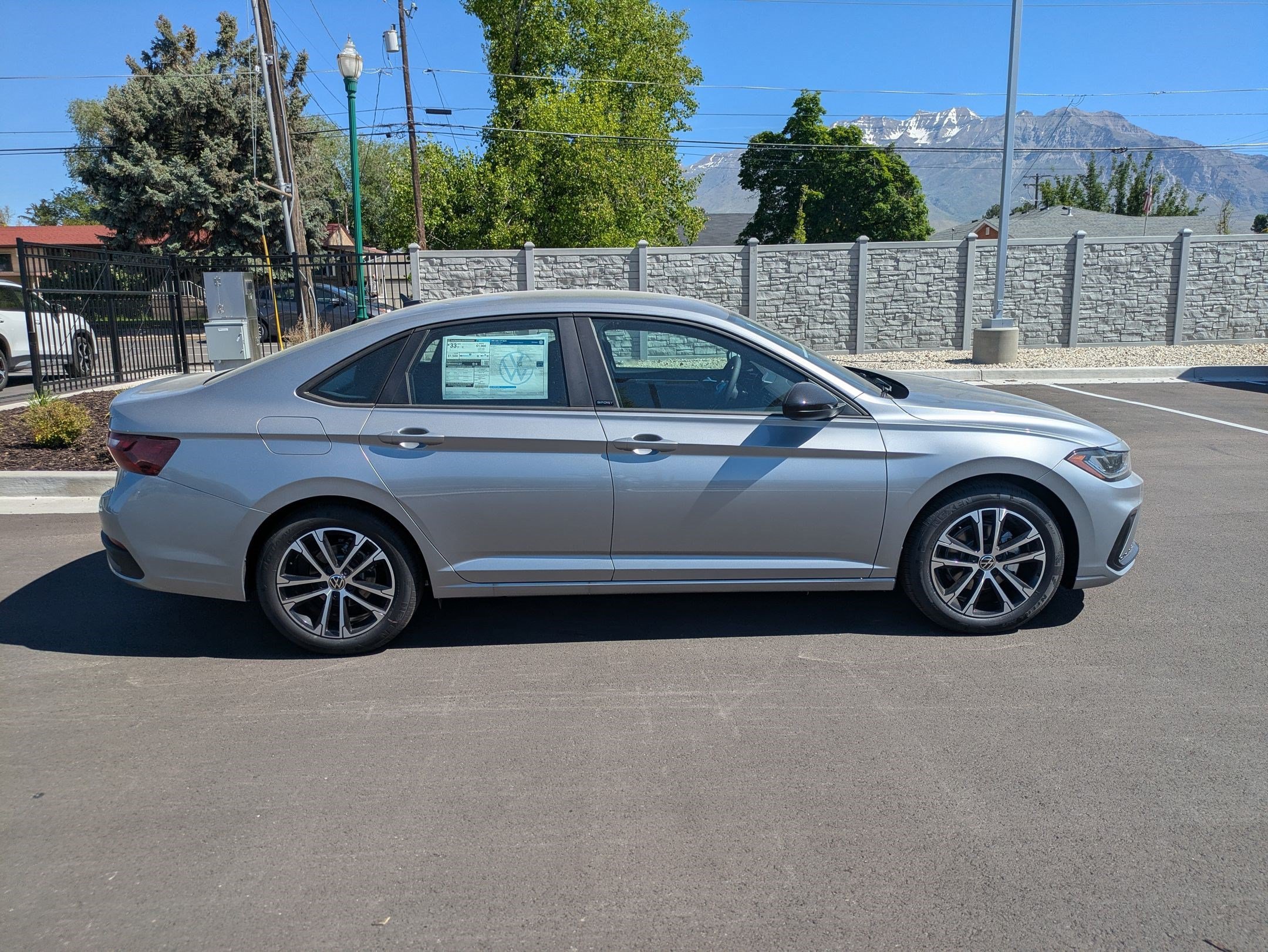 New 2026 Pyrite Silver Metallic Volkswagen Sport image 2