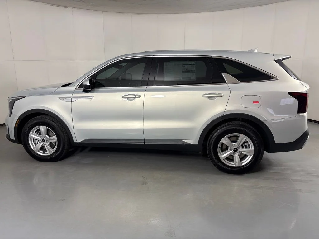 New 2026 Ivory Silver Kia LX image 5