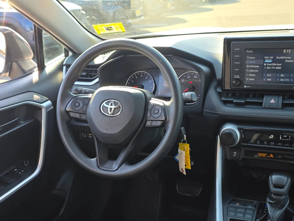 Used 2021 Super White Toyota LE image 26