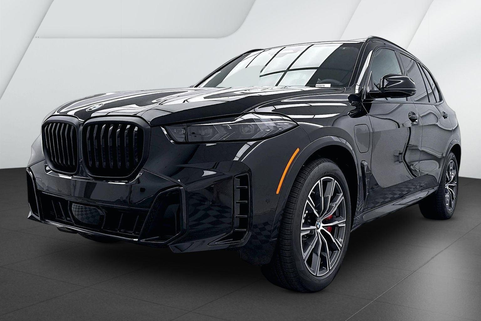 New 2026 Black Sapphire Metallic BMW xDrive50e image 3