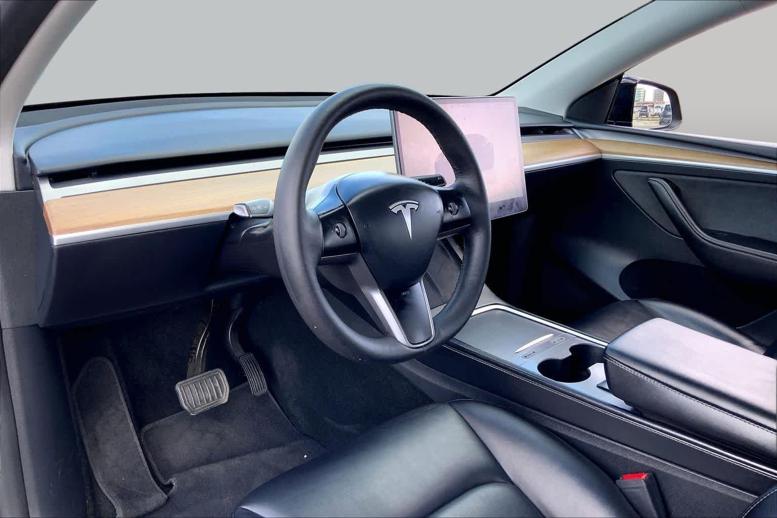 Used 2024 Solid Black Tesla  image 16