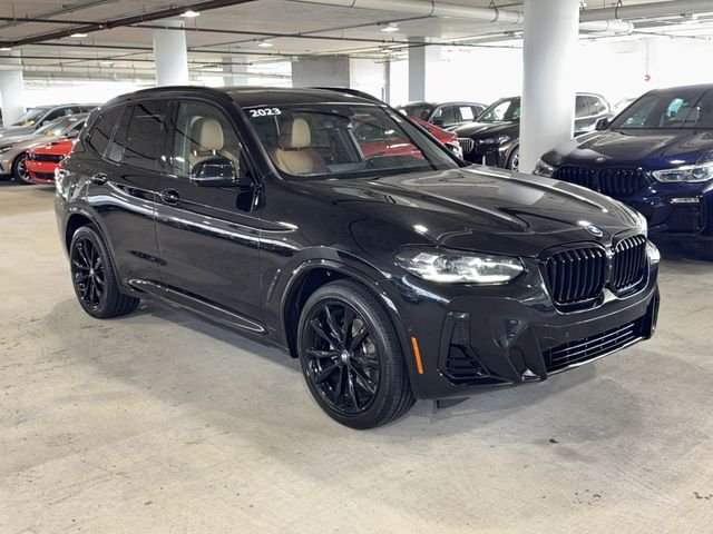 Used 2023 Black Sapphire Metallic BMW sDrive30i image 2