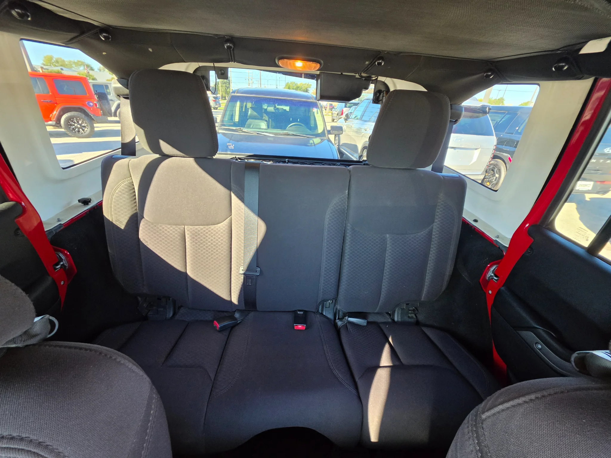 Used 2014 Flame Red Clearcoat Jeep Sport image 13