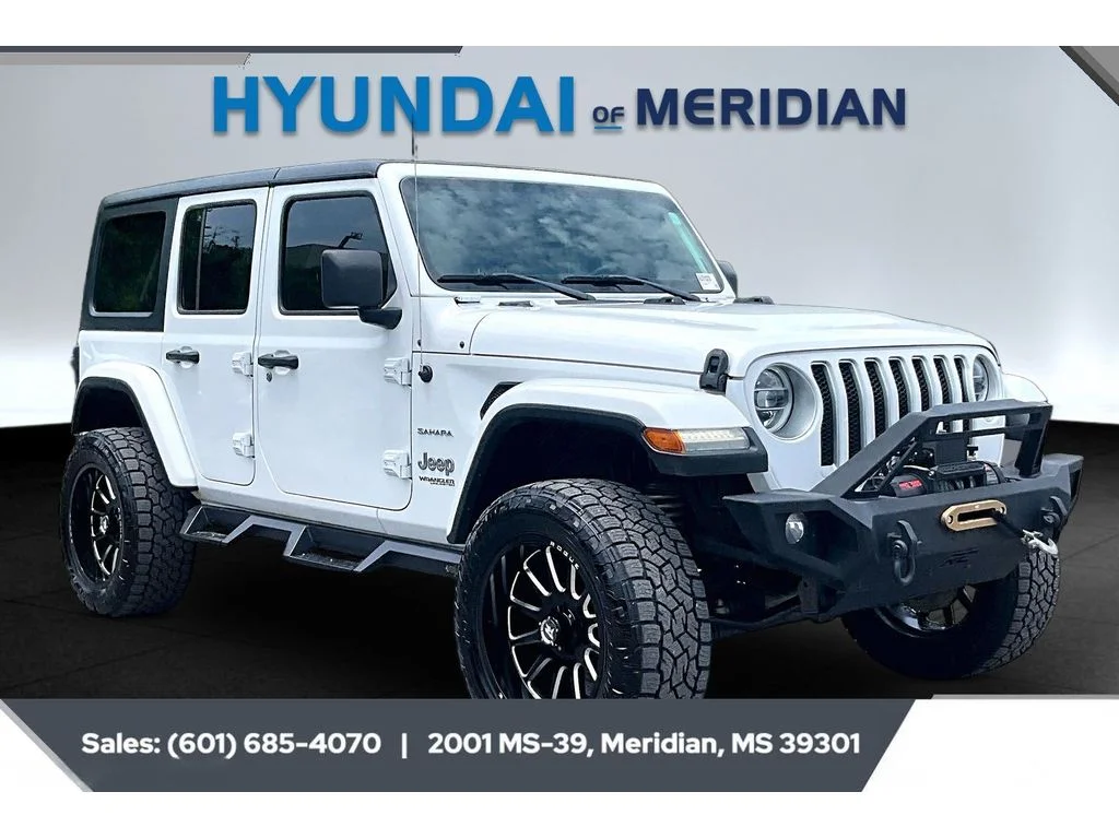 Used 2018 Bright White Clearcoat Jeep Unlimited Sahara image 1