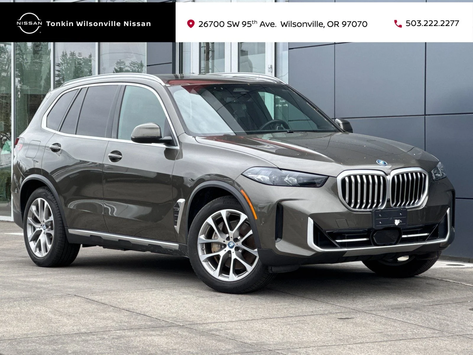 Used 2024 Manhattan Green Metallic BMW xDrive50e image 1