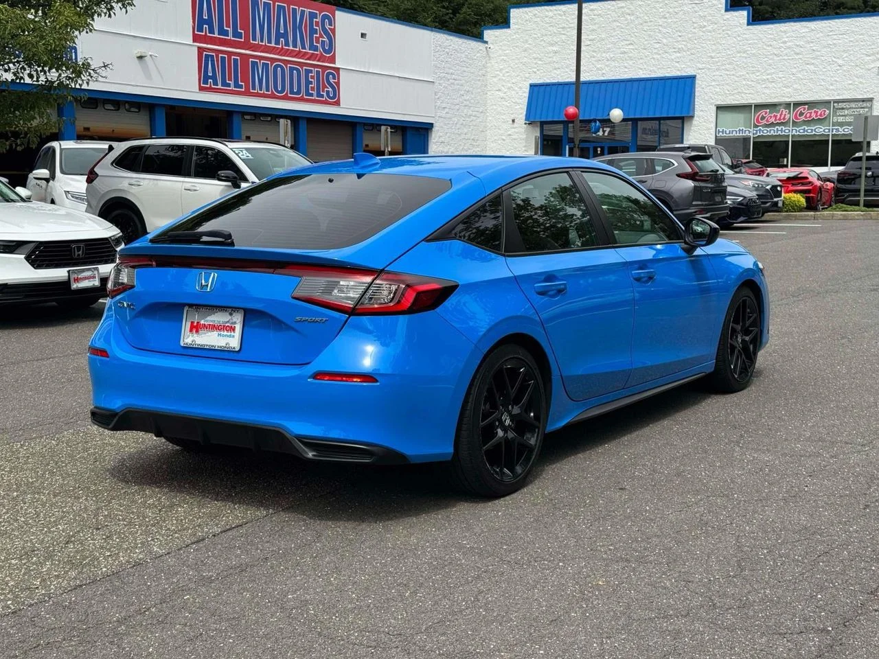 Used 2024 Boost Blue Pearl Honda Sport image 7