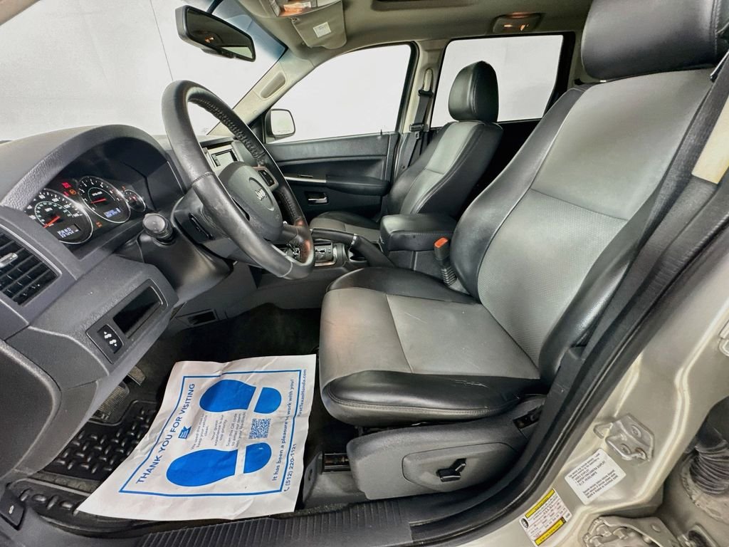 Used 2010 Light Graystone Pearlcoat Jeep Laredo image 25