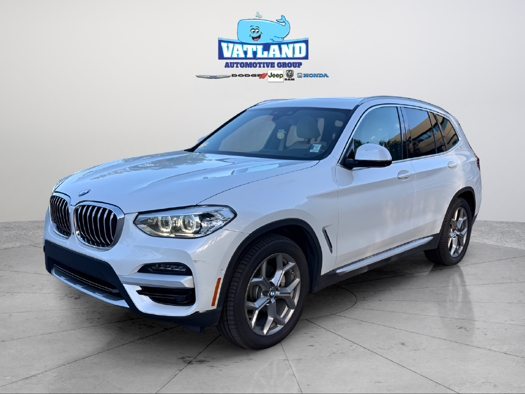 Used 2021 White BMW sDrive30i image 1